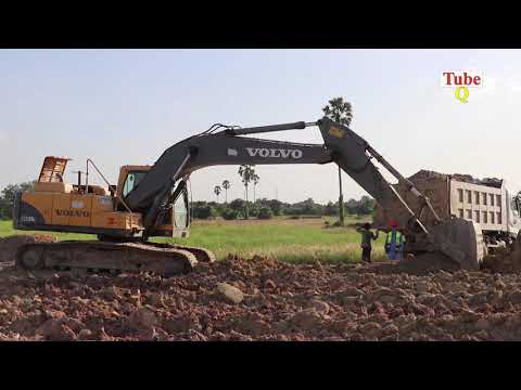 volvo-ec210blc-excavator-and-dump-truck-working