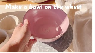 Throw a ceramic bowl on the wheel