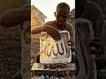 boy made allah caligrapy using ice