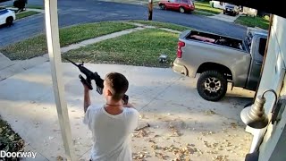 Suspect Points Rifle at Police During Standoff