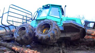 John Deere 810D stuck in deep mud 2