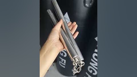 côn nhị khúc.Côn inox tiện vân nặng 450g.có chuông kêu leng keng.côn dành anh e biểu diễn.tập loan