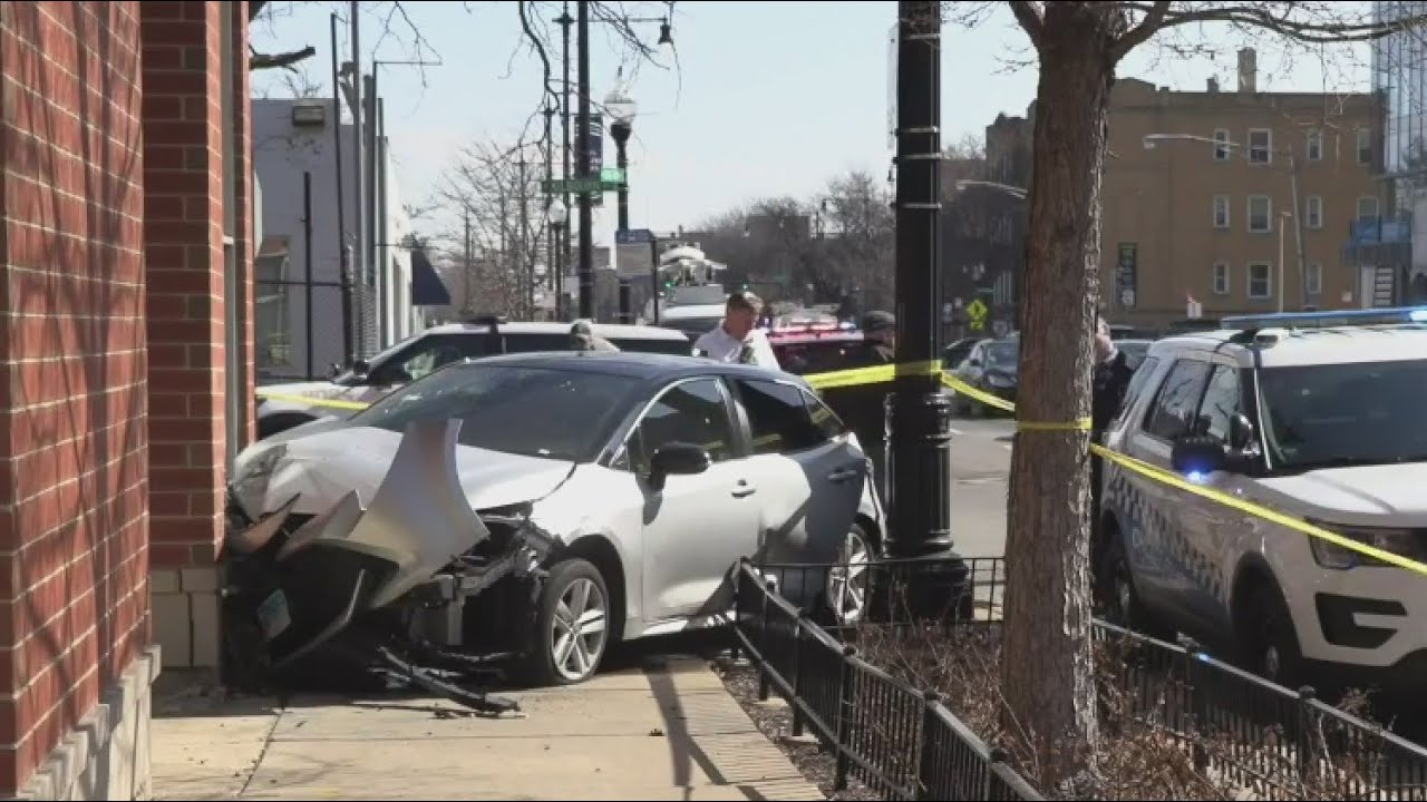 Shootout leads to car crashing into building in Irving Park - YouTube