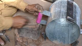 Man Crafts a Cost-Effective Coal Burning Metal Stove