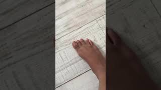 Scratching Toenails On Wooden Floor