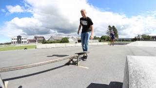 Skater Snaps Board On Boardslide