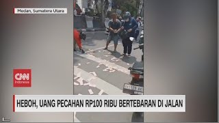 Heboh Uang Rp.100 Ribu Bertebaran di Jalan