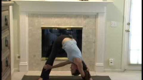 Wide Angle Extended Crossed Arms Twist Yoga Pose