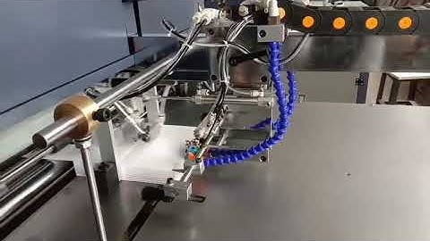 ASJ600 Gluing machine with paper feeder, testing before shipment.