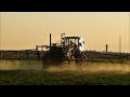 Spraying wheat at sunset with umz and hardi