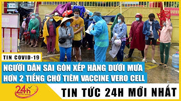 Cận cảnh người dân TP.HCM không ngại xếp hàng dưới mưa hơn 2 tiếng chờ tiêm vắc xin Vero Cell