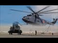 Russian masterpiece mil mi26 picks up a nato ch47 chinook  largest and most powerful helicopter