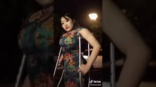 Beautiful Crippled Girl On Crutches.