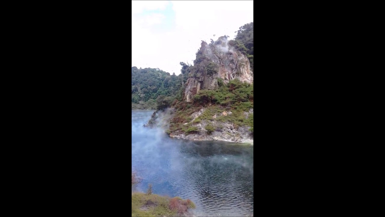Smoking / steaming hot volcanic lake emiting vapour, Tongariro, New Zealand