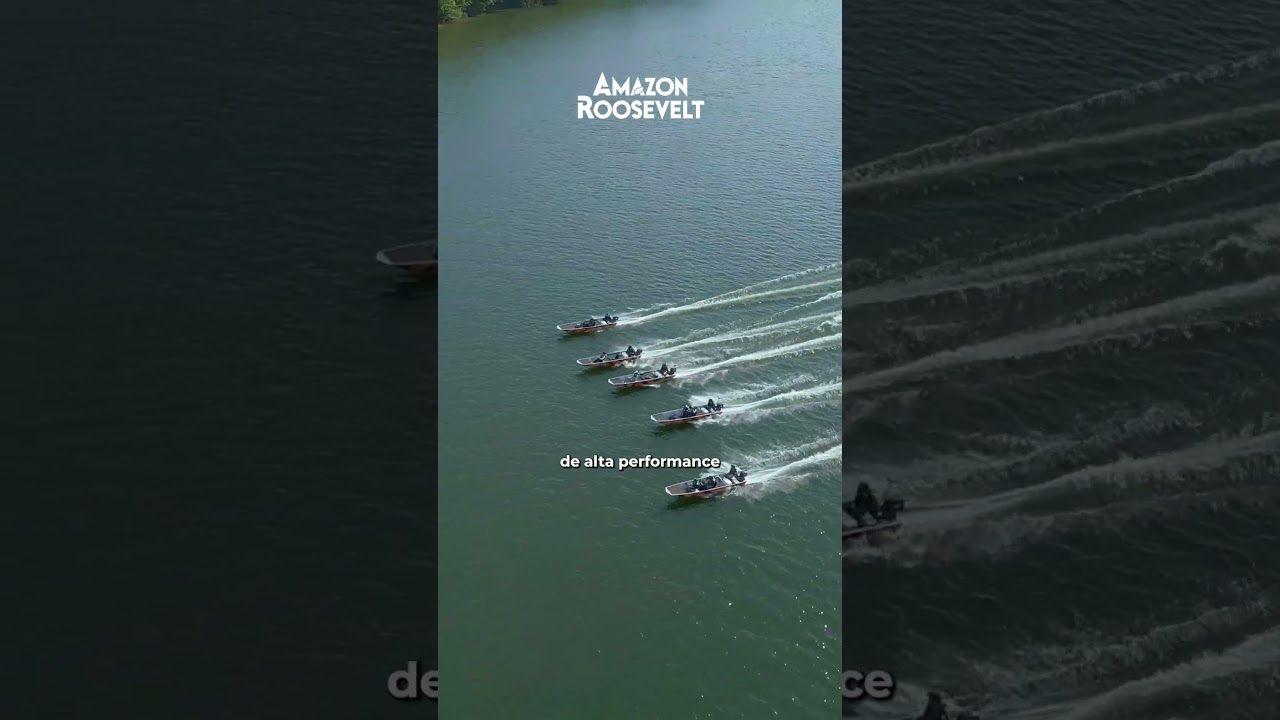 Boats running the river in formation, seen from the air