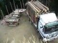 Superb skills   log truck 360 turn around above dangerous cliff edge