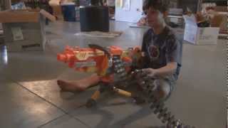 Hopped up Nerf Valcan shooting 50 round belt