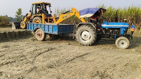#video | Powertrac 439 Plus Tractor Trolley loading soil using by JCB 3dx Backhoe | Jcbvideos