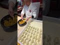 Preparing Chinese Dumplings. Italy Food Festival in Milano