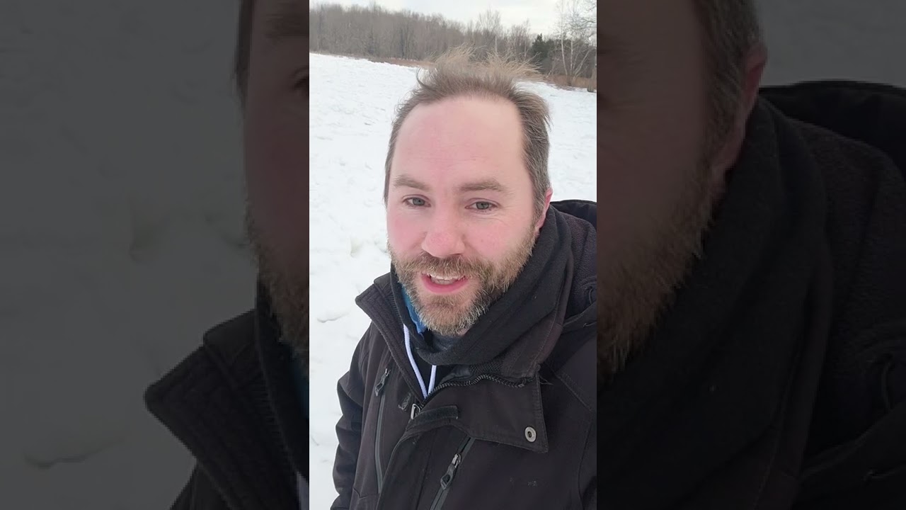 Walking on top of a frozen river.