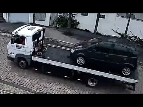 Tough Day For Driver As Car Falls Off Truck - YouTube