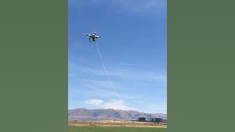 How to retrieve my drone stuck high up in a tree using another drone: part 2 - place the robe