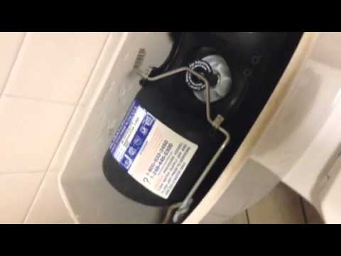 American standard pressure assisted toilet tank - YouTube