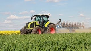 Claas Axion 920 Traktor mit Rabe Kormoran Pflug