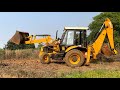 JCB Backhoe Shifting Soil and Mixing Soil For Making A Bricks