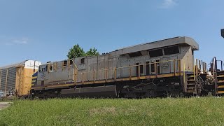 Q116 with an ex citirail trailing goes around the yard at Moterm