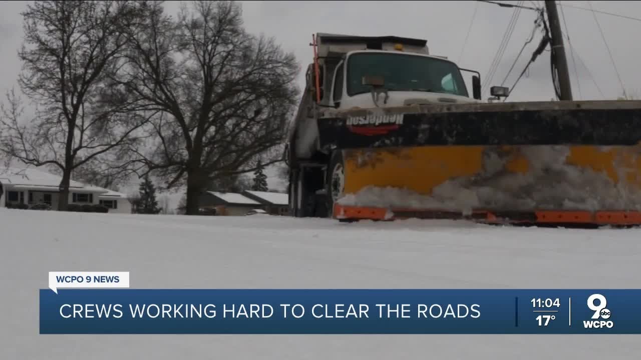 Crews continue working to clear roads as temps fall - YouTube