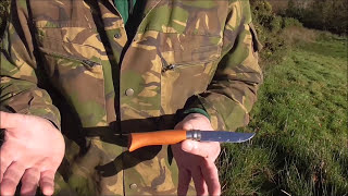 Opinel folding knife review and hard use bushcraft test. Thatched  survival shelter build.
