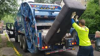 Republic Services Mack LR Mcneilus rear loader garbage truck on a resi trash route/ Bulk Pickup.