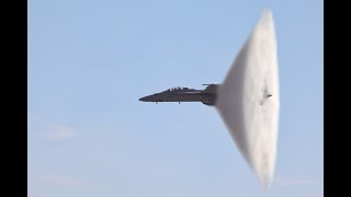 Navy F/A18 Breaking The Sound Barrier Over Water