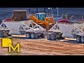 HEAVY MACHINES IN LAS VEGAS WHEEL LOADER MOVING DIRT & LOADING DUMP TRUCKS ON HUGE CONSTRUCTION SITE