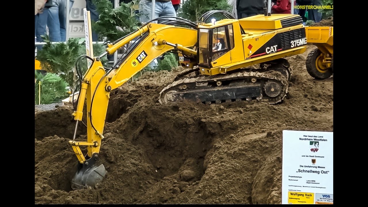 RC Excavator Caterpillar 375ME at work 