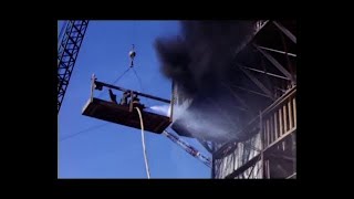 Man gets saved from fire by a crane in the last second