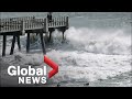 Isaias regains hurricane strength as Carolinas prepare for storm surge, flooding