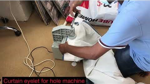 Curtain eyelet hole machine