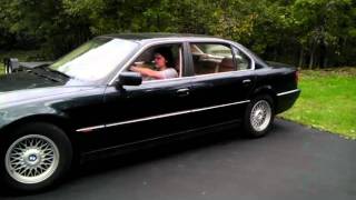 BMW 740il revving with open headers
