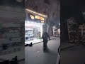 الناس كلها خارجة ومنتشرة على الطريق الرئيسى فى محلة مرحوم وبيقضو مصالحهم 
