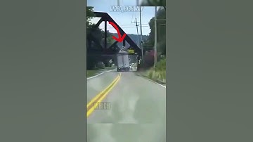 Truck Hits Low Bridge!