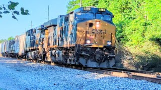 Northbound CSX mixed manifest on track two, crossing Cooper Avenue