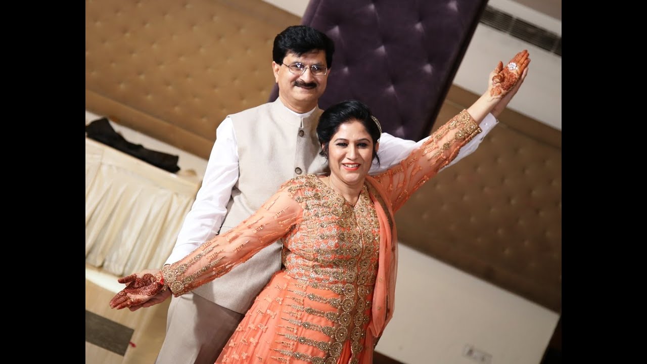 Beautiful Couple Dance By Mom Dad At Sangeet Ceremony On