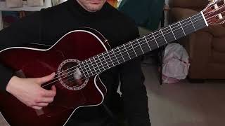 The nylon-string guitar from HELL with THREE PICKUPS inside!