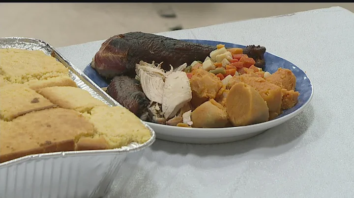 Volunteers serving Thanksgiving meal at Salvation Army in Youngstown