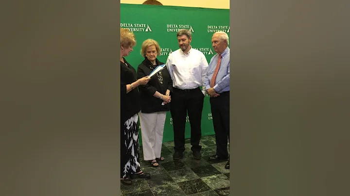 Dr. Kent and Janice Wyatt with a recipient of the ...