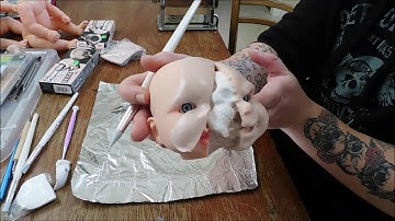 polymer clay on a vinyl doll?