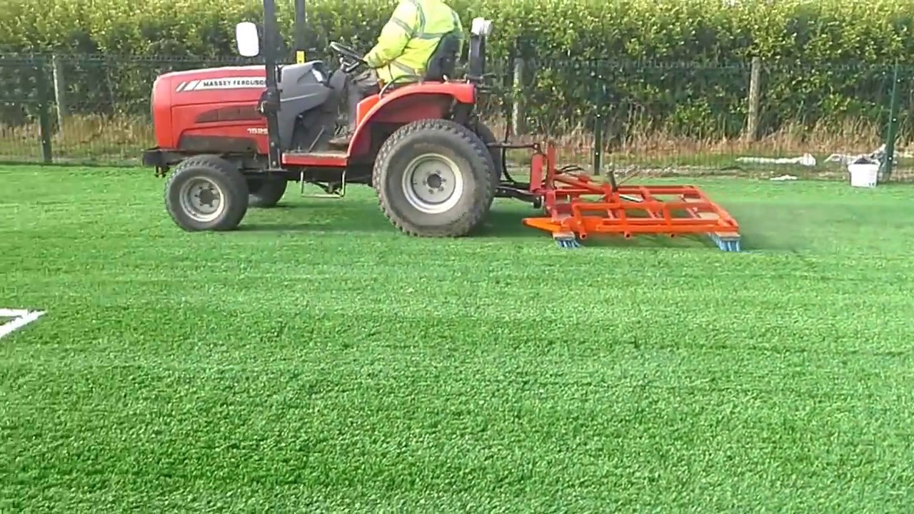 Maintenance of artificial grass pitch - YouTube