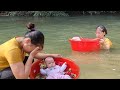 The mother went to take a bath and let the baby float down the river.